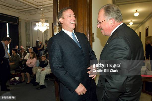Jim Kelly, Pro Football Hall of Fame member and founder of Hunter's Hope, speaks with Rep. Tom Reynolds, R-N.Y., talk before the start of the news...