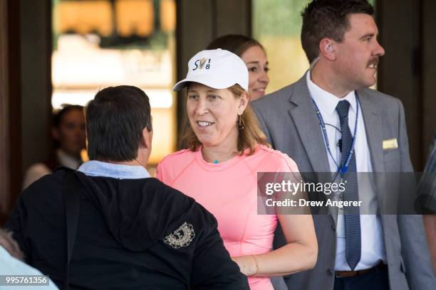 Susan Wojcicki , chief executive officer of YouTube, talks with Bill Koenigsberg , founder and chief executive of Horizon Media, as they arrive at...