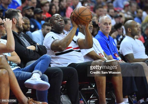 Los Angeles Lakers president of basketball operations Earvin 'Magic' Johnson attends a game between the Lakers and the New York Knicks during the...
