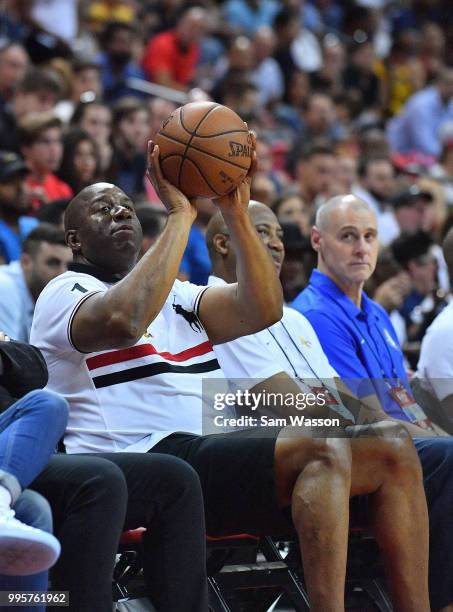 Los Angeles Lakers president of basketball operations Earvin 'Magic' Johnson attends a game between the Lakers and the New York Knicks during the...