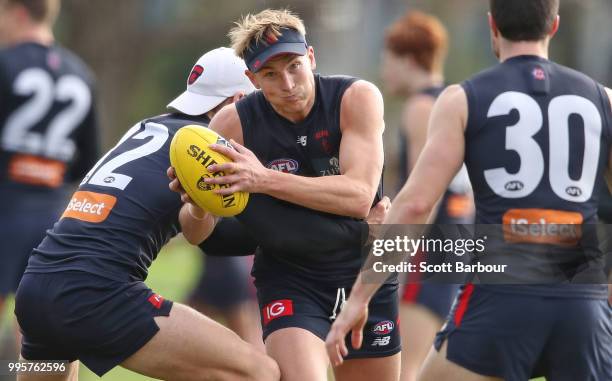 Bernie Vince of the Demons runs with the ball during a Melbourne Demons AFL training session at Gosch's Paddock on July 11, 2018 in Melbourne,...