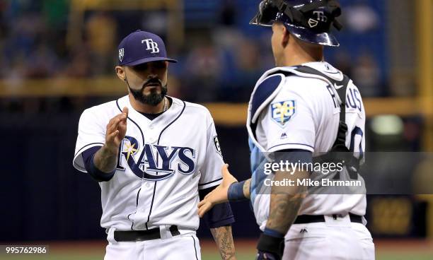 Sergio Romo and Wilson Ramos of the Tampa Bay Rays celebrates winning a game against the Detroit Tigers at Tropicana Field on July 10, 2018 in St...