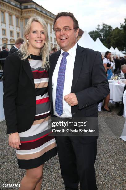 Former minister Hans-Peter Friedrich and his girlfriend Diana Troglauer during the Summer Reception of the Bavarian State Parliament at Schleissheim...