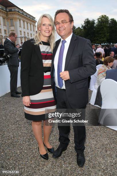 Former minister Hans-Peter Friedrich and his girlfriend Diana Troglauer during the Summer Reception of the Bavarian State Parliament at Schleissheim...