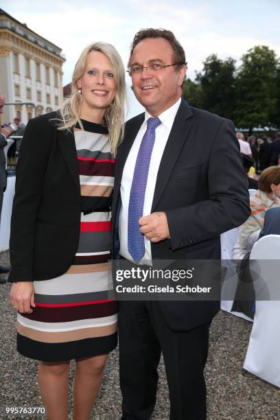 Former minister Hans-Peter Friedrich and his girlfriend Diana Troglauer during the Summer Reception of the Bavarian State Parliament at Schleissheim...