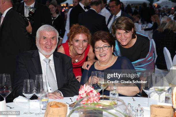Barbara Stamm and her husband Ludwig Stamm and their daughter Sissi and Claudia Stamm during the Summer Reception of the Bavarian State Parliament at...