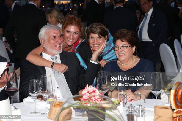 Barbara Stamm and her husband Ludwig Stamm and their daughter Sissi and Claudia Stamm during the Summer Reception of the Bavarian State Parliament at...