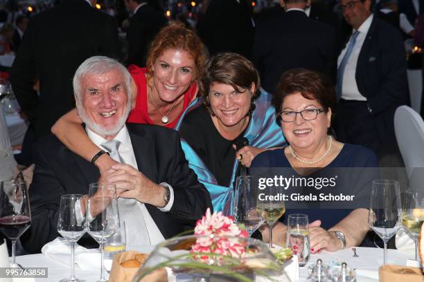 Barbara Stamm and her husband Ludwig Stamm and their daughter Sissi and Claudia Stamm during the Summer Reception of the Bavarian State Parliament at...