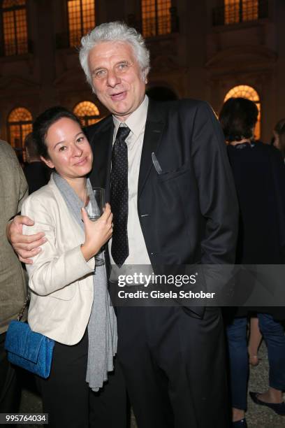 Udo Wachtveitl and his girlfriend Lila Schulz during the Summer Reception of the Bavarian State Parliament at Schleissheim Palace on July 10, 2018 in...