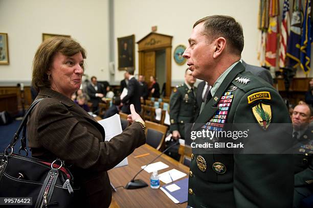 Rep. Carol Shea-Porter, D-N.H., speaks with Gen. David Petraeus, commander of the U.S. Central Command, during a break in the House Armed Services...