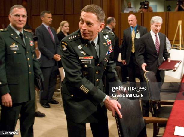 Armed Forces Commander in Iraq Gen. David Petraeus and U.S. Ambassador to Iraq Ryan Crocker arrive to testify during the Senate Foreign Relations...