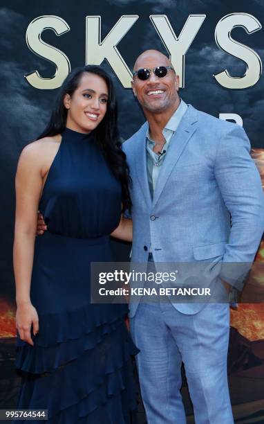 Actor Dwayne Johnson and his daughter Simone Alexandra Johnson attend the premiere of 'Skyscraper' on July 10, 2018 in New York City.