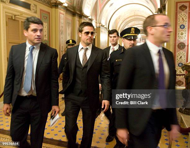Actor Brad Pitt arrives in the U.S. Capitol to discuss his Make It Right Foundation with Senate Majority Leader Harry Reid on Thursday, March 5,...