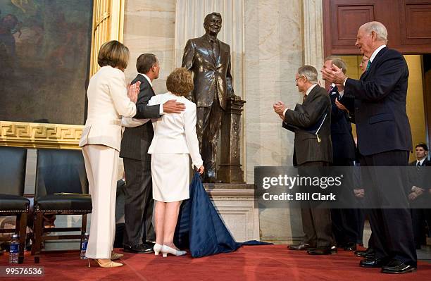 From left, Speaker of the House Nancy Pelosi, House Minority Leader John Boehner, former First Lady Nancy Reagan, Senate Majority Leader Harry Reid,...