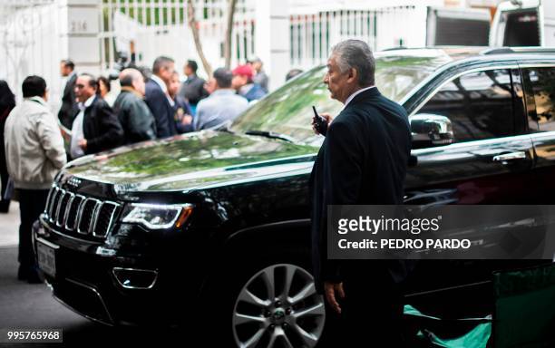 Security personnel remain outside Mexico's President-elect Andres Manuel Lopez Obrador party's headquarters in Mexico City on July 9, 2018. - The...