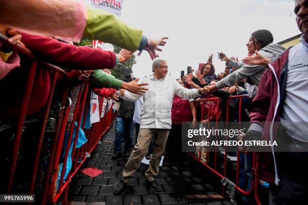 Mexico's then presidential candidate for the MORENA party, Andres Manuel Lopez Obrador , greets supporters after a campaign rally in Tlaxcala, Mexico...