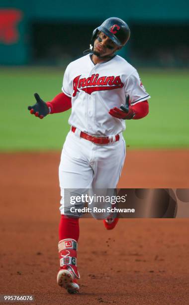 Francisco Lindor of the Cleveland Indians rounds the bases after hitting a solo home run off starting pitcher Sal Romano of the Cincinnati Reds...