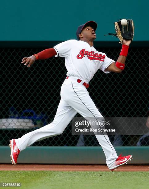 Greg Allen of the Cleveland Indians makes a running catch to get out Scooter Gennett of the Cincinnati Reds during the fourth inning at Progressive...