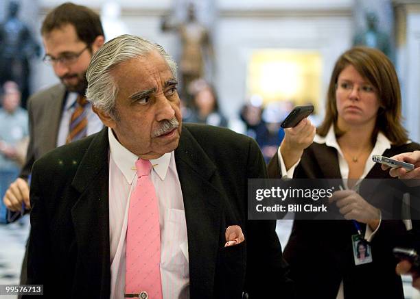 Reporters follow Rep. Charlie Rangel, D-N.Y., through Statuary Hall as he leaves Speaker Pelosi's office on Tuesday, Oct. 27, 2009.