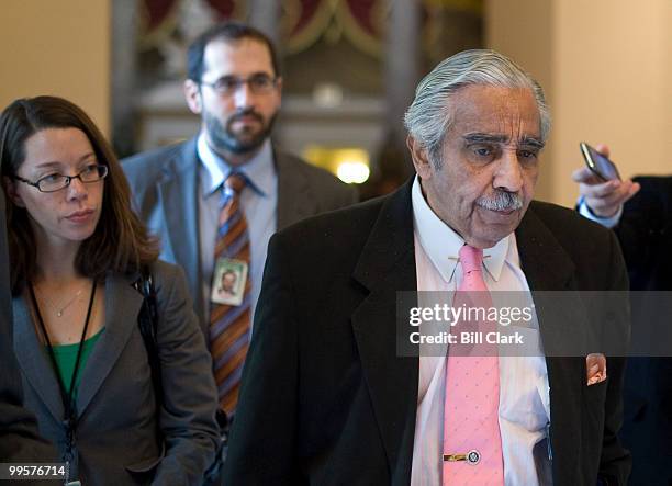 Reporters follow Rep. Charlie Rangel, D-N.Y., through Statuary Hall as he leaves Speaker Pelosi's office on Tuesday, Oct. 27, 2009.