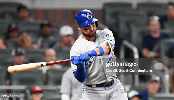 Kevin Pillar of the Toronto Blue Jays knocks in a run with an eighth inning single against the Atlanta Braves at SunTrust Park on June 26, 2018 in...