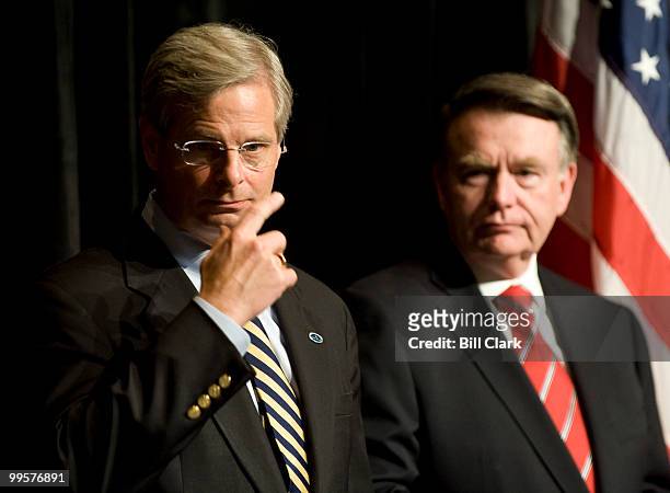 Campaign manager Rick Davis, left, and chairman of the Republican National Committee Mike Duncan speak to the media gathered for the Republican...