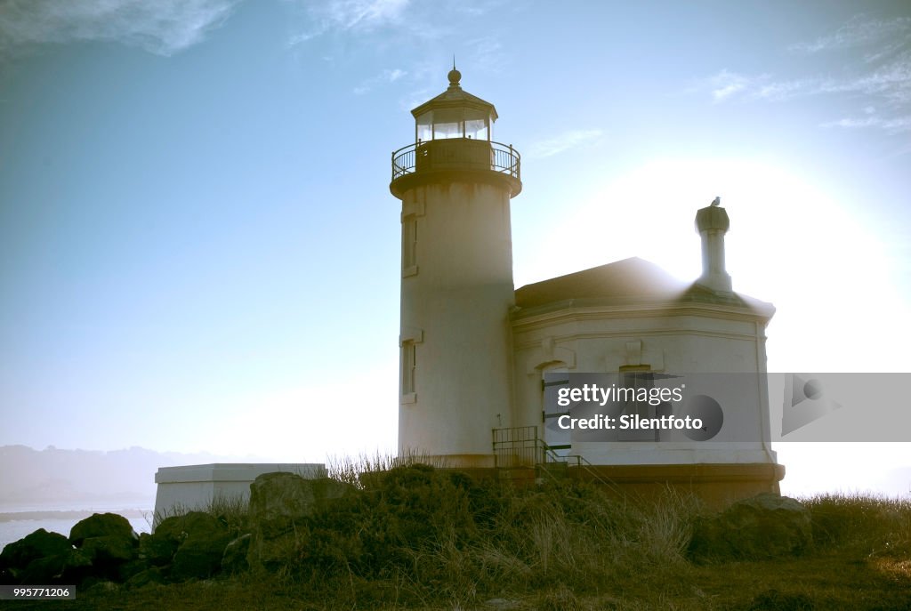 Derelict Lighthouse among Sand Dunes on Oregon Coast