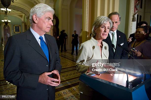 From left, Sen. Chris Dodd, D-Conn., HHS Secretary Kathleen Sebelius and Sen. Tom Carper, D-Del., hold a news conference on healthcare reform in the...