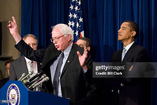 From left, Senate Majority Leader Harry Reid, Sen. Bernie Sanders, I-Vt., Sen. Russell Feingold, D-Wisc., and Sen. Barack Obama, D-Ill., participate...