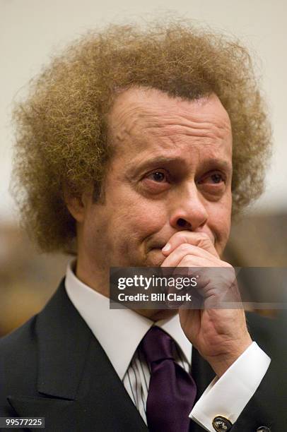 Fitness advocate Richard Simmons tears up as members of the House Education and Labor Committee compliment him on his advocacy for youth fitness...