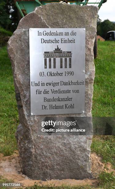 The memorial stone for former chancellor Kohl wiht a metal plaque, photographed after a CDU campaign event in Tellow near Teterow, Germany, 31 August...