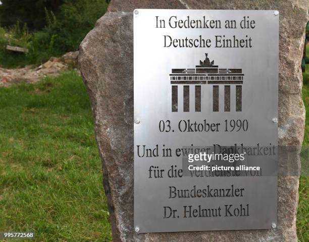 The memorial stone for former chancellor Kohl wiht a metal plaque, photographed after a CDU campaign event in Tellow near Teterow, Germany, 31 August...