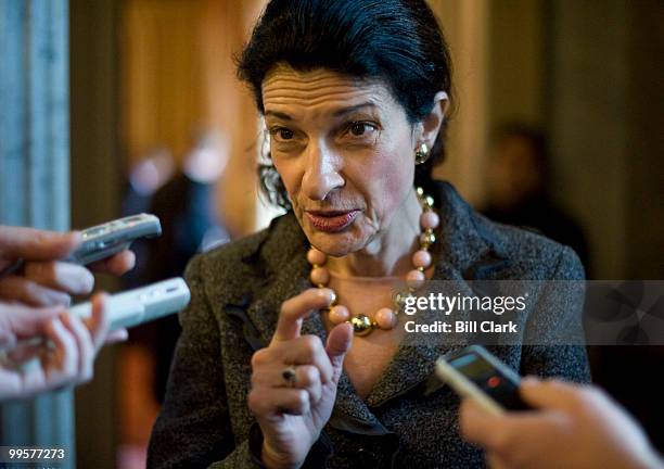 Sen. Olympia Snowe, R-Maine, speaks to reporters as she makes her way to the Senate Republican Policy lunch on Tuesday, Oct. 27, 2009.