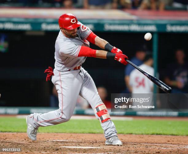 Jose Peraza of the Cincinnati Reds hits an RBI single off Cody Allen of the Cleveland Indians during the ninth inning at Progressive Field on July...