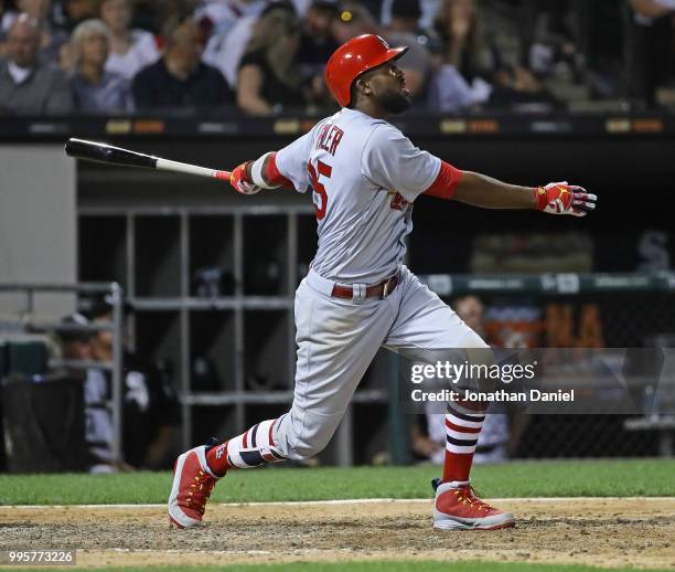 Dexter Fowler of the St. Louis Cardinalshits a grand slam home run in the 6th inning against the Chicago White Sox at Guaranteed Rate Field on July...