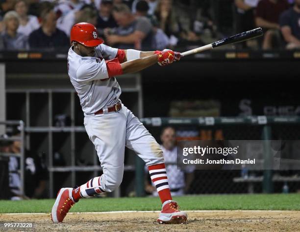 Dexter Fowler of the St. Louis Cardinalshits a grand slam home run in the 6th inning against the Chicago White Sox at Guaranteed Rate Field on July...