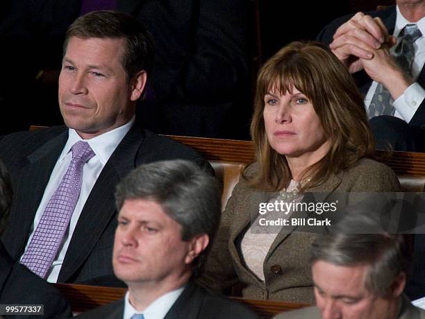 Rep. Connie Mack, R-Fla., and Rep. Mary Bono Mack, R-Calif., listen as President Barack Obama delivers his first State of the Union Address before a...