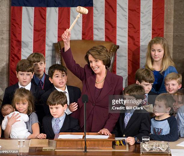 Speaker of the House Nancy Pelosi invites members children, including her own grandchildren, up to the podium to touch the gavel on the House Floor...