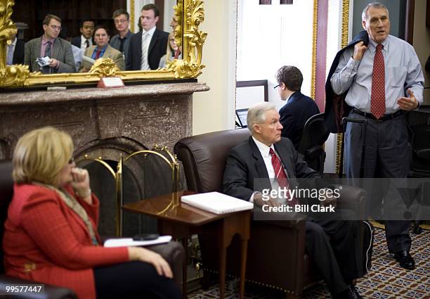 From left, Sen. Claire McCaskill, D-Mo., Sen. Jeff Sessions, R-Ala., and Sen. Jon Kyl, R-Ariz., speak to reporters about spending caps in the Senate...
