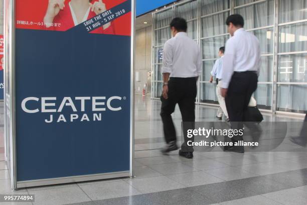 Visitors arrive during the opening of the entertainment electronics fair Ceatec in Chiba near Tokyo, Japan, 03 October 2017. Photo: Christoph...