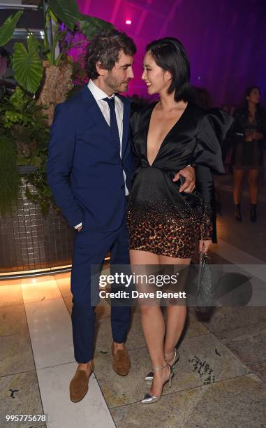 Robert Konjic and Betty Bachz attend the BVLGARI MAN WOOD ESSENCE event at Sky Garden on July 10, 2018 in London, England.