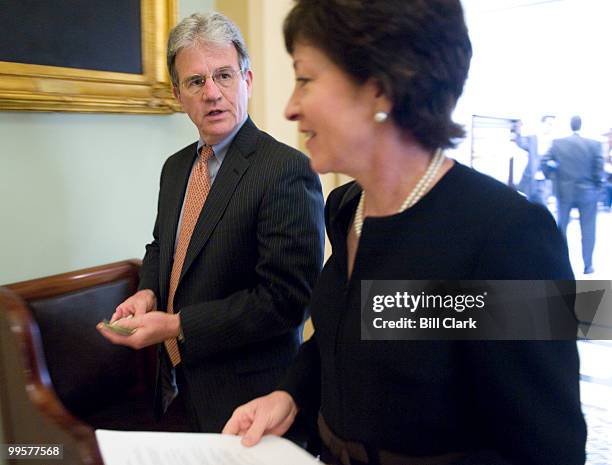 Sen. Tom Coburn, R-Okla., speaks with Sen. Susan Collins, R-Maine, as they leave the Senate Republican Steering Committee meeting in the Mansfield...