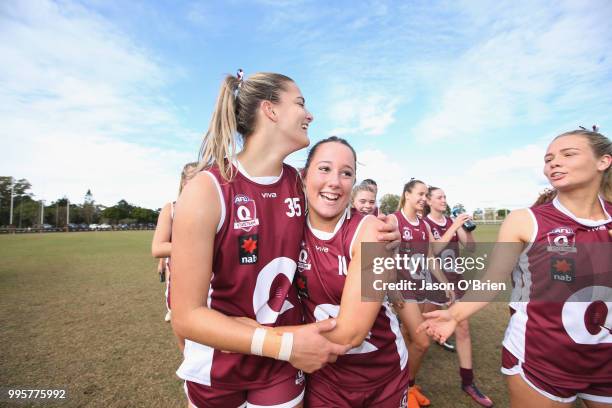 Queensland's Lauren Bella and Jacquiline Yorston celebrate during the AFLW U18 Championships match between Queensland and Vic Metro at Broadbeach...