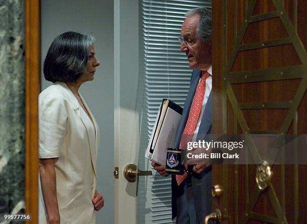 Sen. Tom Harkin, D-Iowa, speaks with Julie Gerberding, director of the Centers for Disease Control and Prevention, before the start of the Senate...