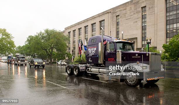 Convoy of trucks with their horns blaring drives down Independence Ave. As they circle the National Mall to draw attention to rising fuel prices on...