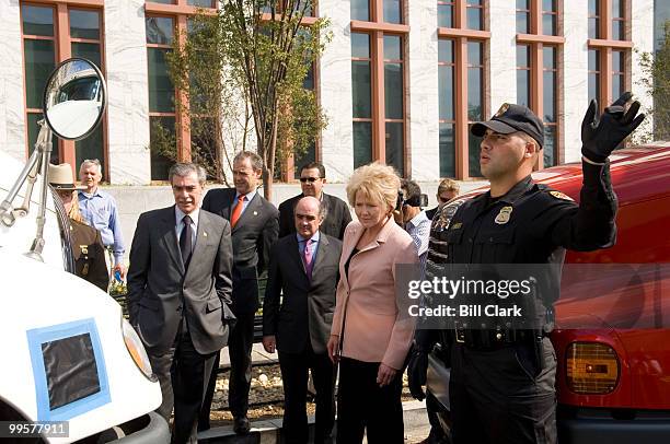 From left, Commerce Secretary Carlos Gutierrez, Mexican Secretary of Communications and Transportation Luis Tellez, and Transportation Secretary Mary...