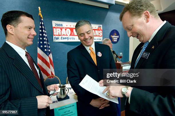 From left, candidates for Congress William Russell, R-Pa., Vince Micco, R-N.J., and Duane Sand, R-N.Dak., talk before the start of the Iraq Veterans...