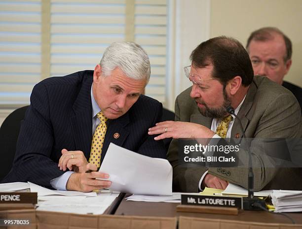 From left, Rep. Mike Pence, R-Ind., speaks with Rep. Steven LaTourette, R-Ohio, during the HOUSE COMMITTEE TO INVESTIGATE THE VOTING IRREGULARITIES...