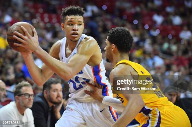 Kevin Knox of the New York Knicks looks to drive against Josh Hart of the Los Angeles Lakers during the 2018 NBA Summer League at the Thomas & Mack...