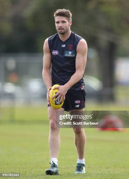 Jesse Hogan of the Demons runs with the ball during a Melbourne Demons AFL training session at Gosch's Paddock on July 11, 2018 in Melbourne,...